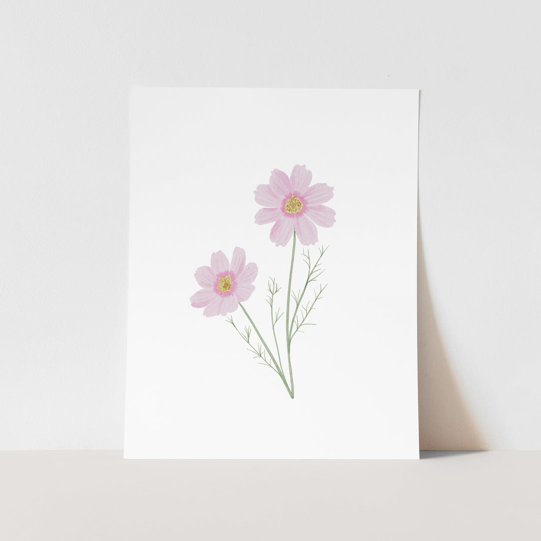 A white paper with a simple illustration of two pink flowers with green stems.