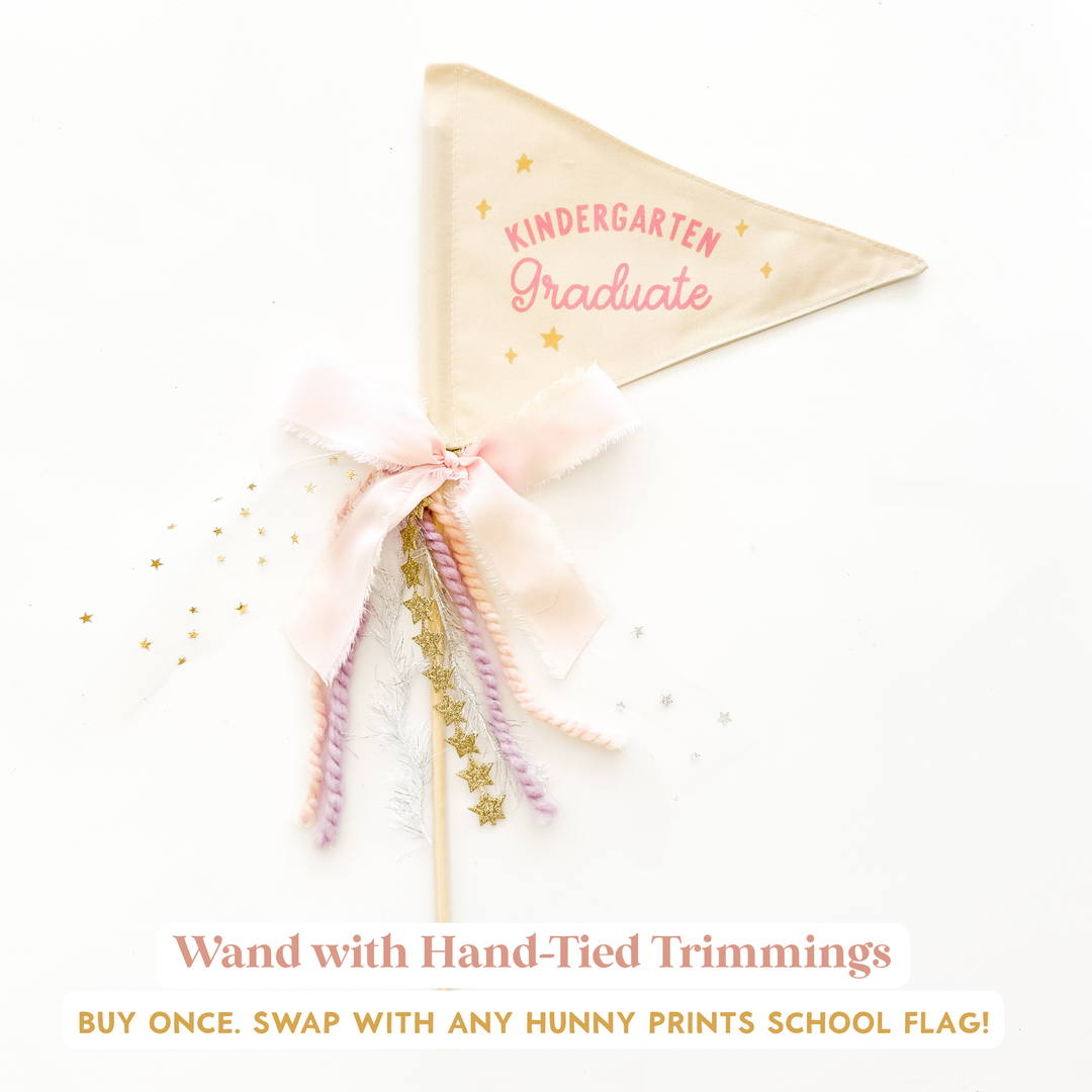 a banner with the text "KINDERGARTEN Graduate" and decorative elements such as stars and a ribbon.