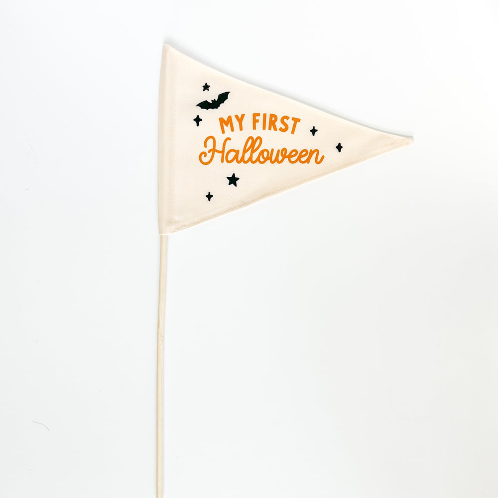 Halloween-themed flag with 'My First Halloween' text on a white background