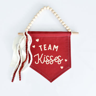 Team Kisses Hang Sign