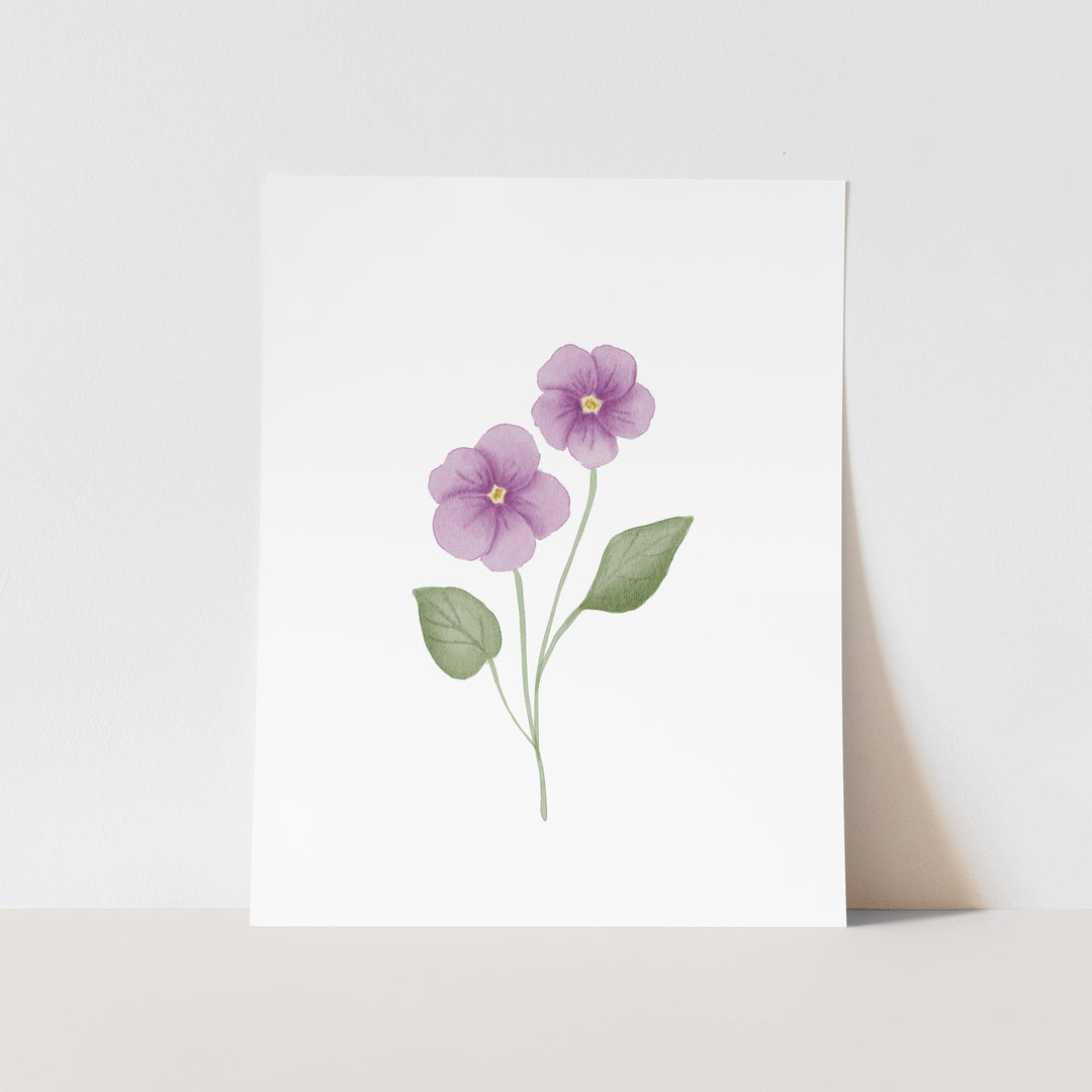 A white paper with a simple illustration of two purple flowers with green leaves.