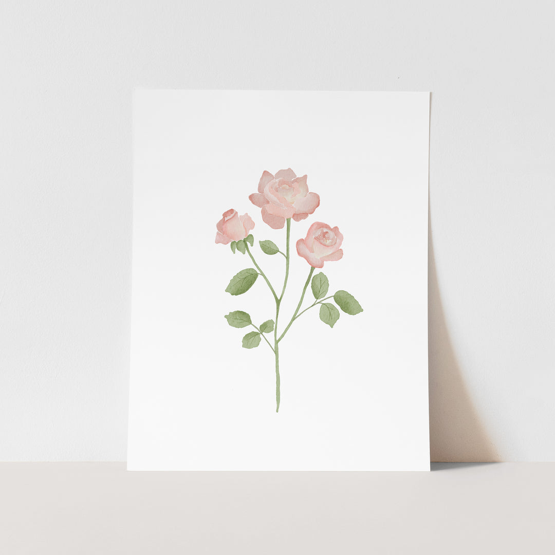 A white paper with a watercolor illustration of three pink roses on a stem.